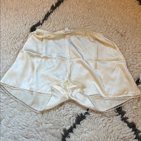 DONNI. Silk Tap Shorts in Light Yellow - Picture 17 of 17